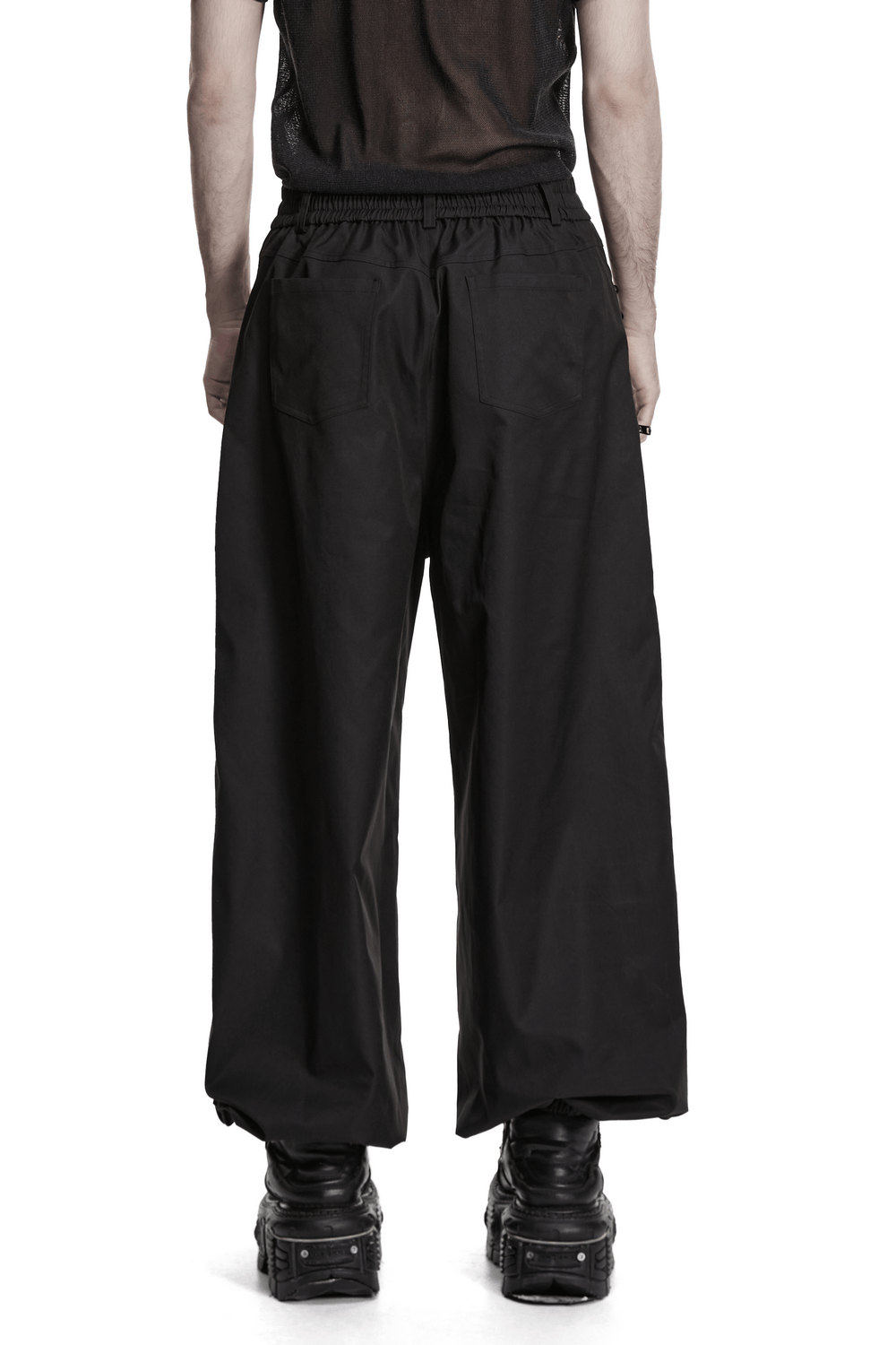 Black Techwear Wide Leg Pants with Pressed Strips, showcasing a loose streetwear style from the back.