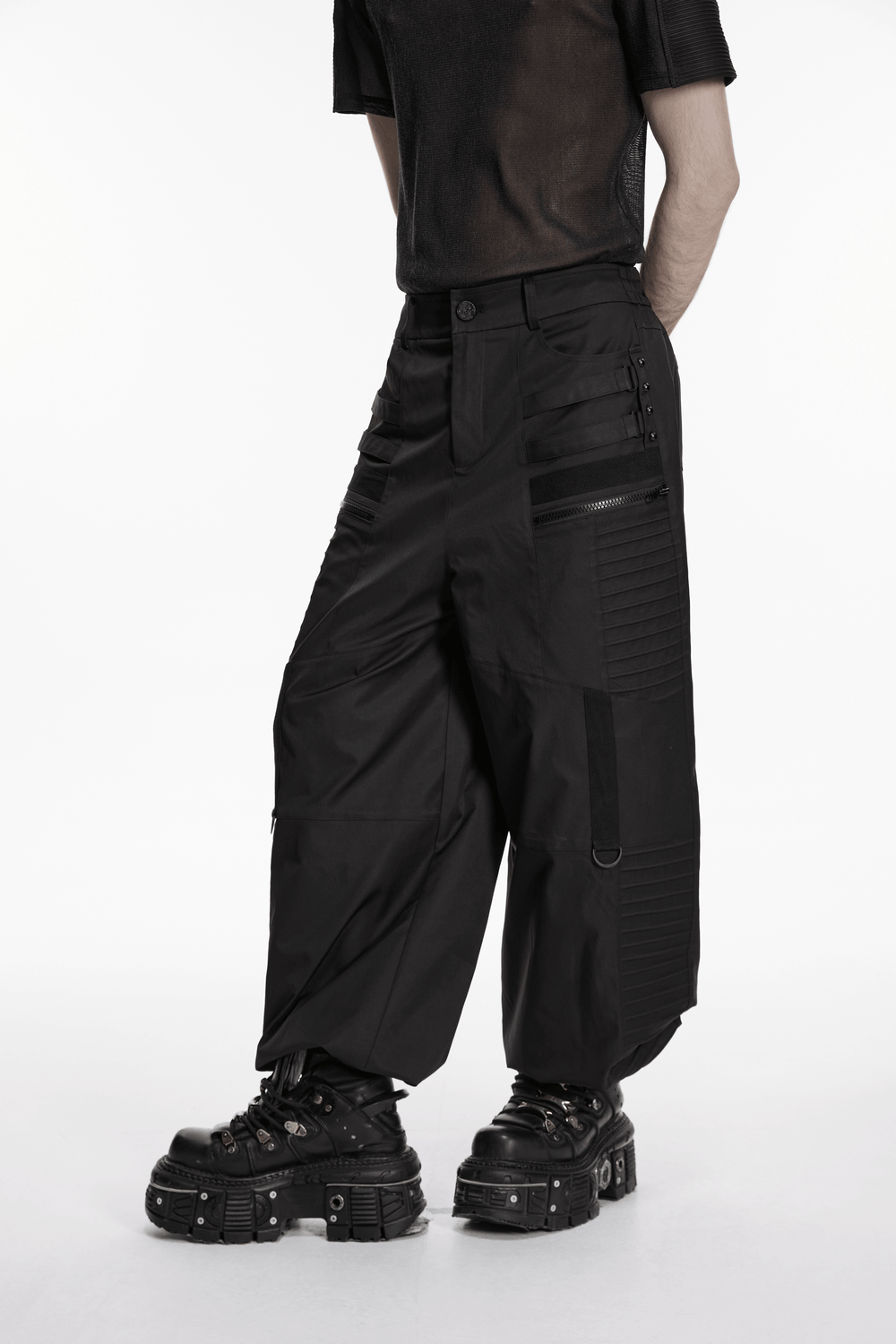 Black Techwear Wide Leg Pants with Pressed Strips featuring geometric paneling and ankle cinching design.