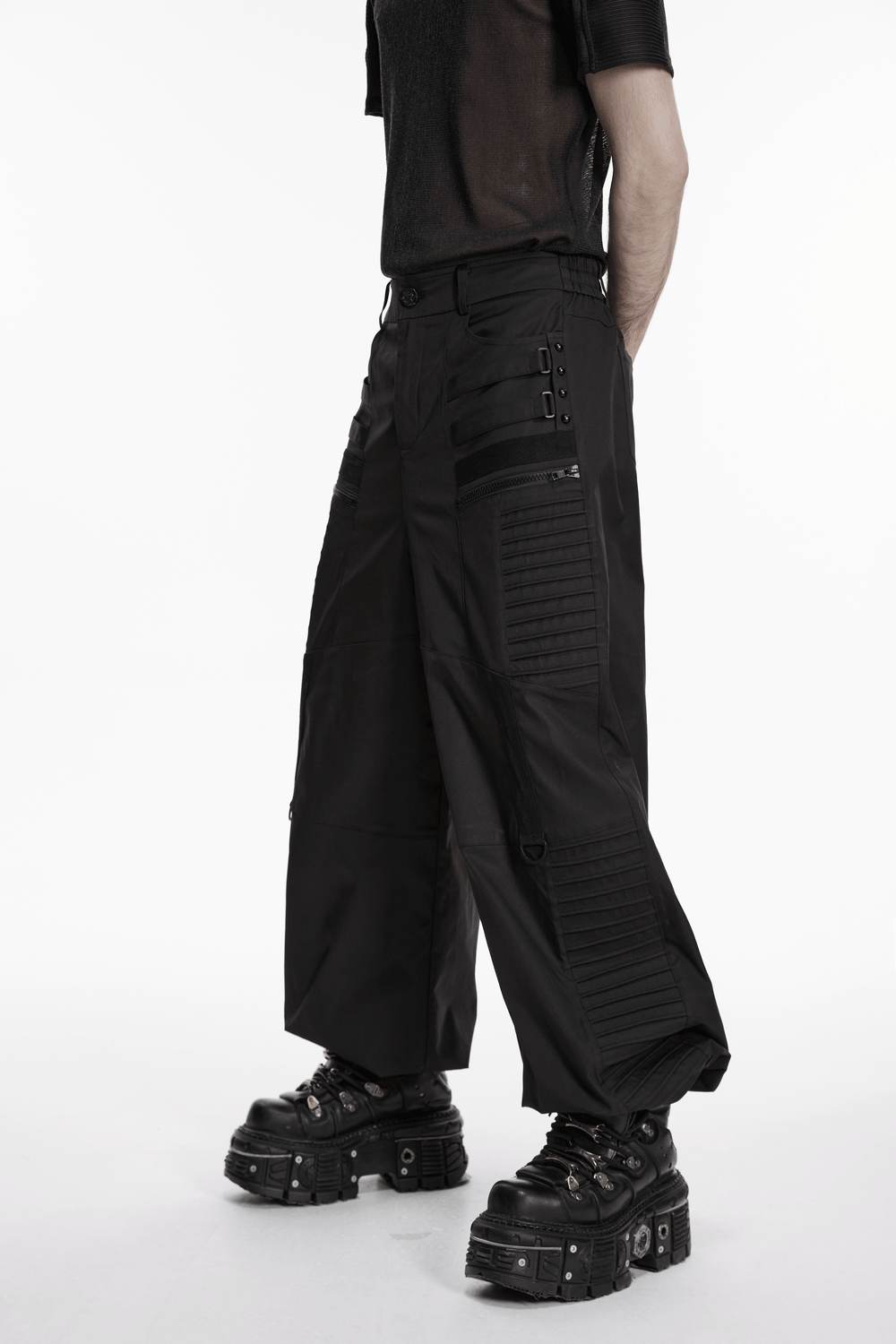 Black Techwear Wide Leg Pants with Pressed Strips showcasing a loose streetwear profile and 3D pressed strips.