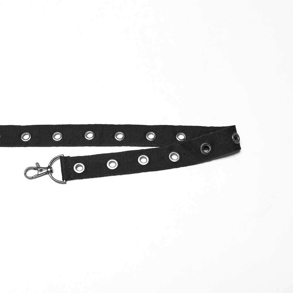 Black eyelet strap with hooks, perfect for enhancing drop crotch pants and adding a stylish edge.