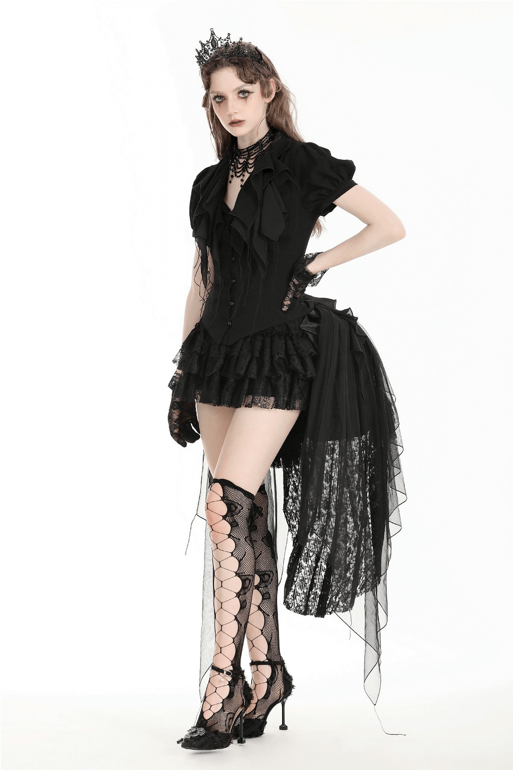 Woman in a stylish black ruffle mini dress with lace details, gloves, and stylish thigh-high stockings.