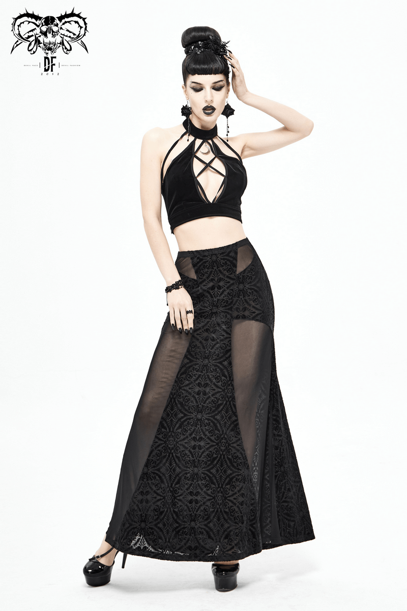Gothic fashion model in black transparent skirt and crop top, showcasing stylish and sexy look for women.