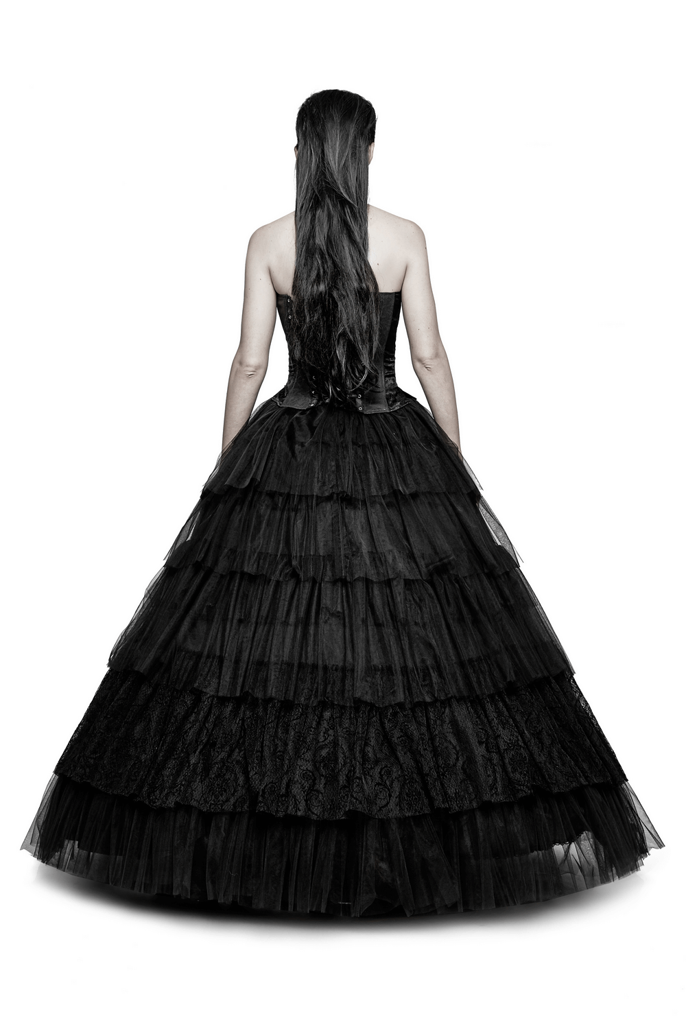 Back view of a black tulle long skirt gothic wedding dress with lace details, showcasing its elegant layers.