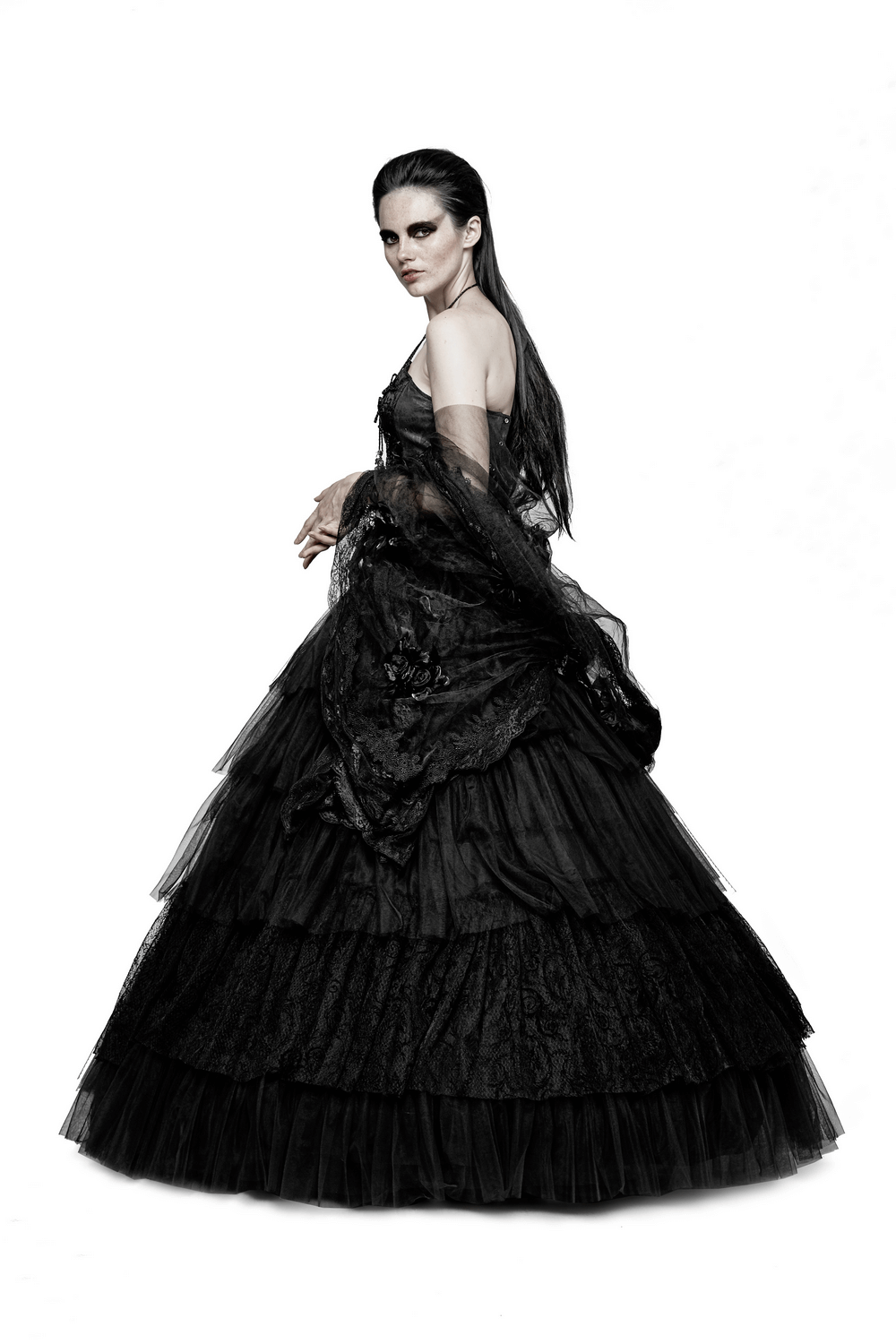 Gothic black tulle long skirt gown with lace details, creating a dramatic bridal look for women.