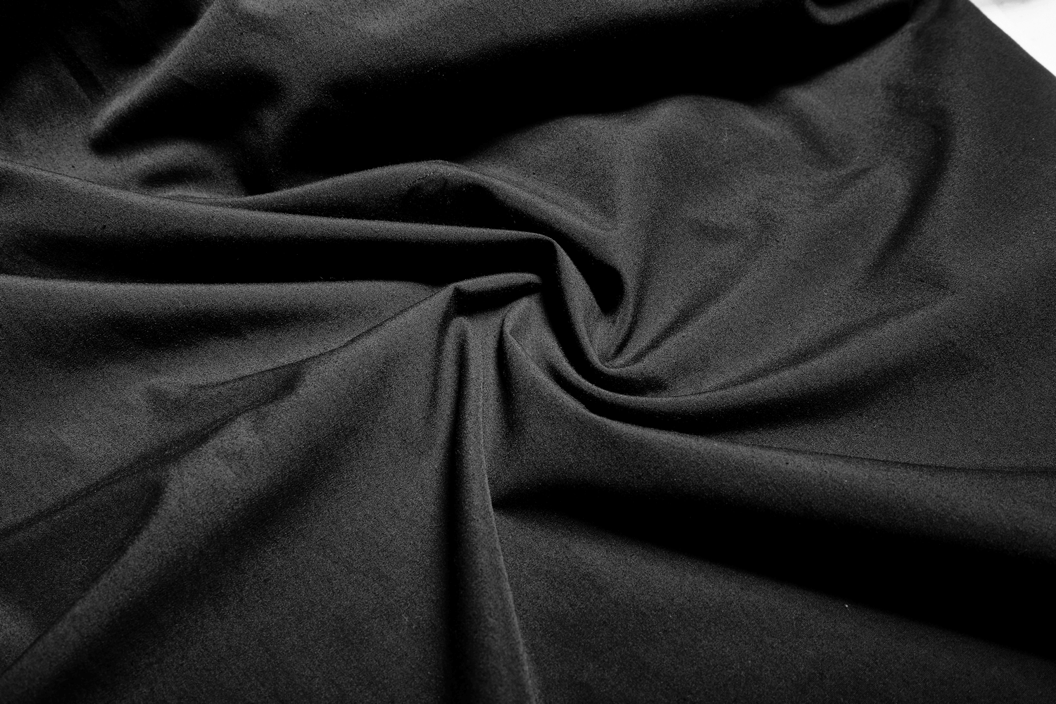 Luxurious black fabric with a smooth texture, perfect for creating elegant gothic clothing and accessories.