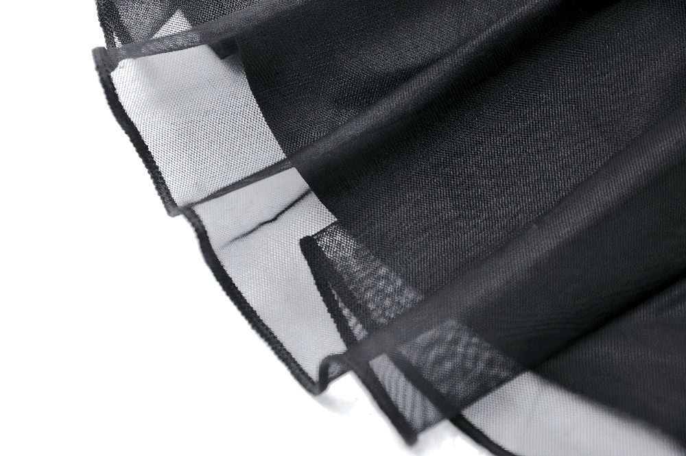 Close-up of a black tulle fabric showcasing a flowing design and delicate edges, perfect for stylish skirts.