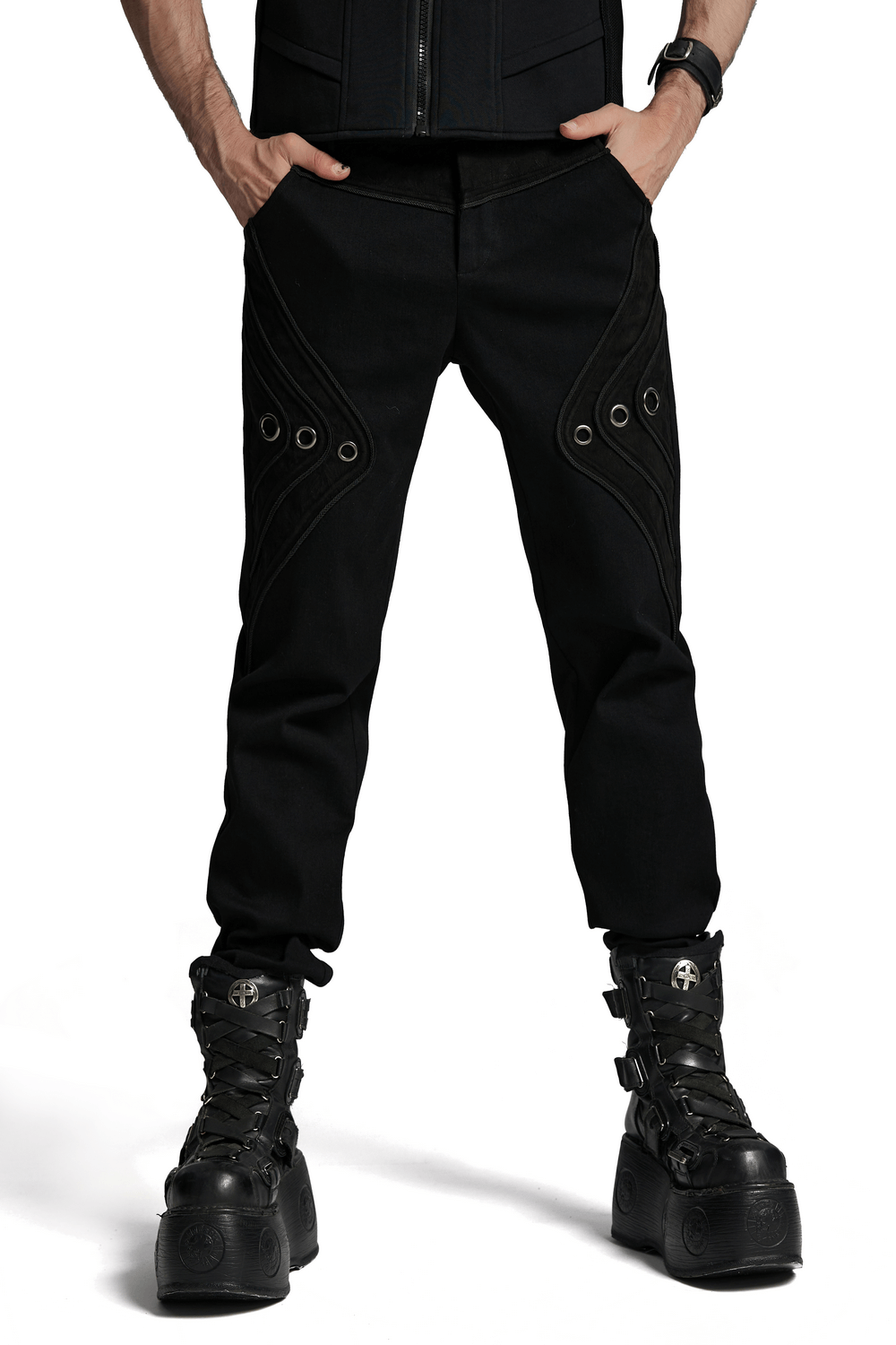 Black twill denim pants with eyelet details and pockets, styled with punk-inspired 3D patchwork design.