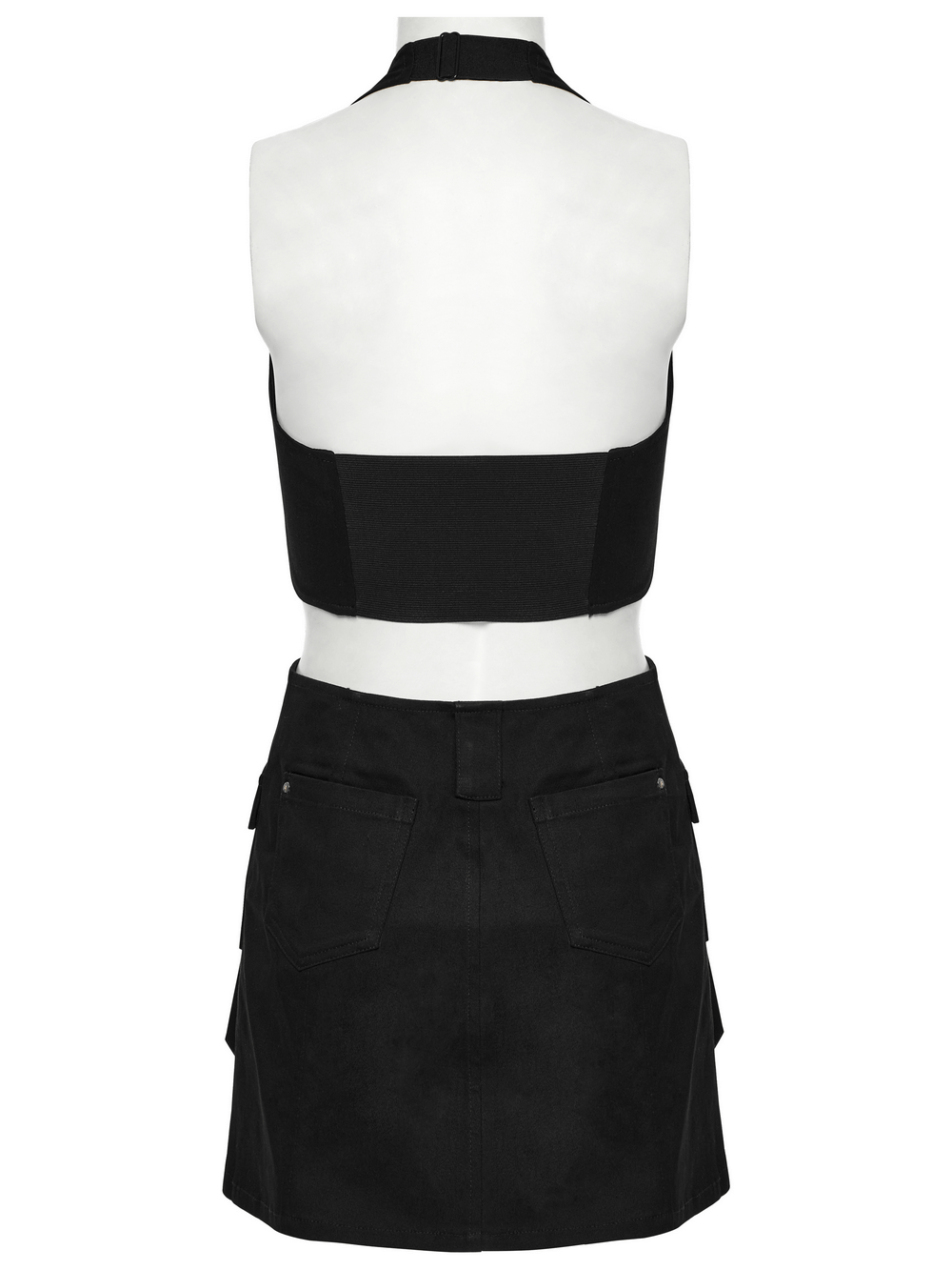 Back view of black twill punk harness dress with utility pockets and halter neck, showcasing zipper and strap details.