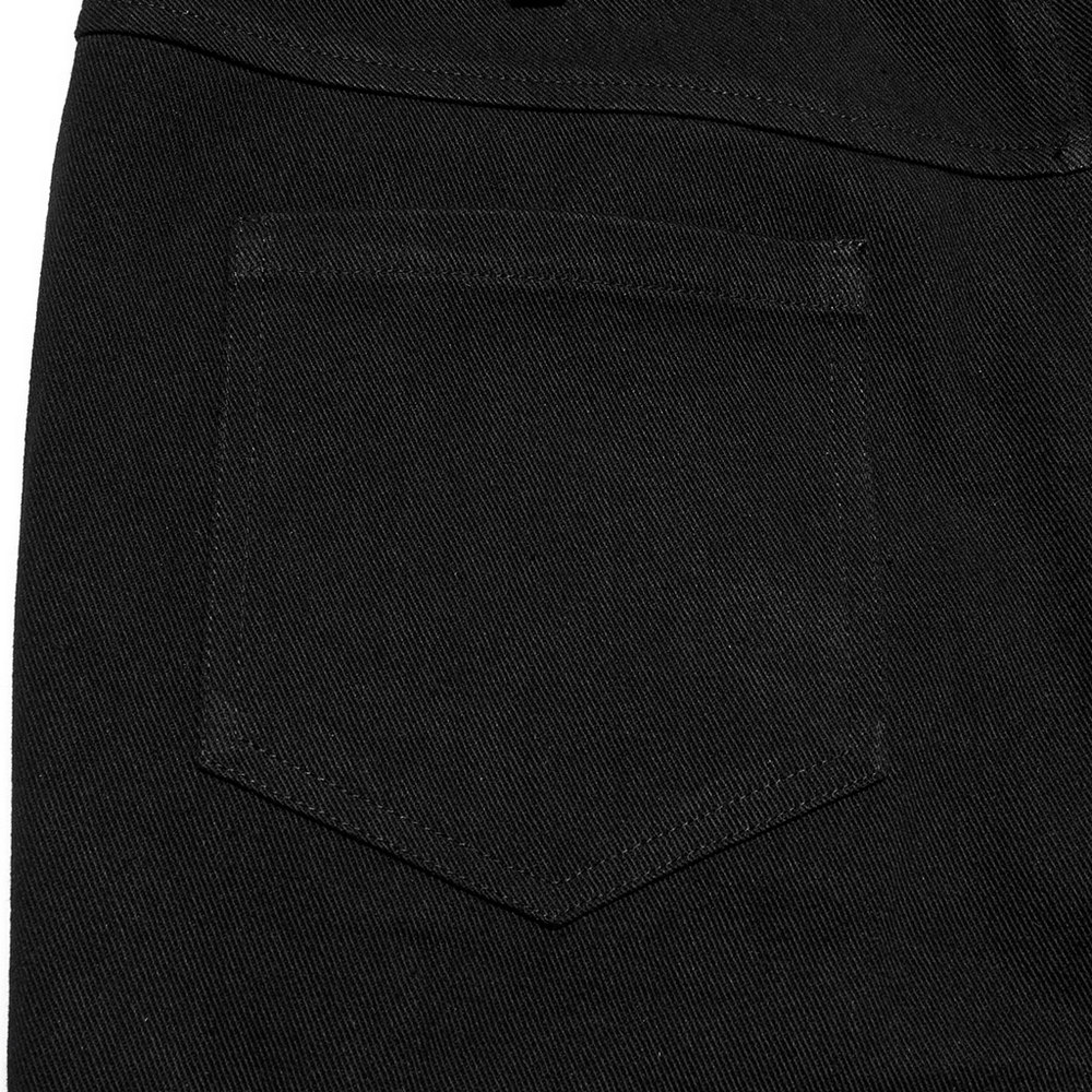 Close-up of a back pocket on black twill punk pants, showcasing sleek design and sturdy stitching details.