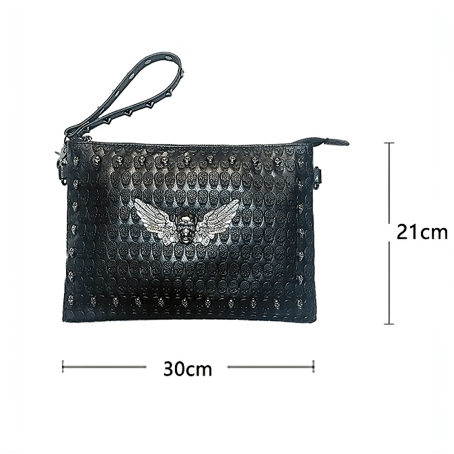 Black unisex shoulder bag with skull and wings design, perfect for concerts and edgy fashion, measuring 30cm x 21cm.
