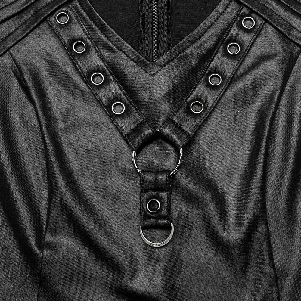 Close-up of a stylish black v-neck top featuring chic shoulder pads and a sleek movable loop detail.