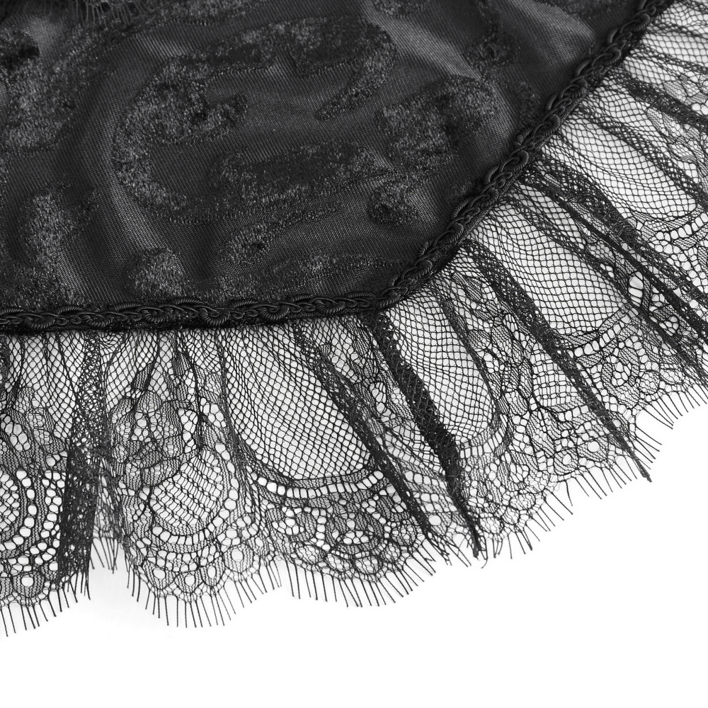 Elegant black lace detail with intricate trim, perfect for gothic capes and dramatic costumes.