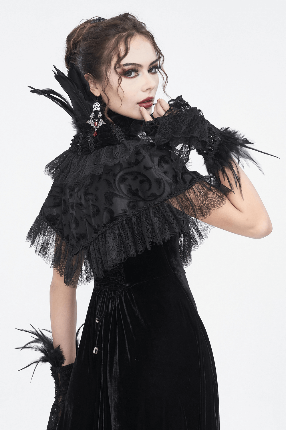 Elegant black velvet gothic cape with lace and feathers, perfect for costumes and dramatic outfits.