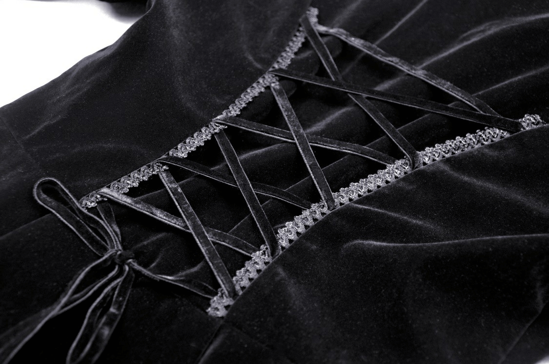 Close-up of black velvet coat detail with elegant lace corset and ribbon ties, perfect for gothic fashion enthusiasts.