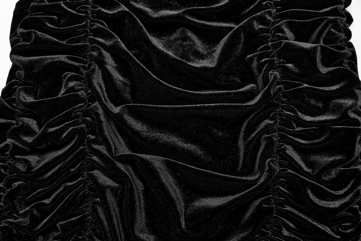 Black velvet fabric with ruffled texture showcasing gothic elegance for a mini skirt.