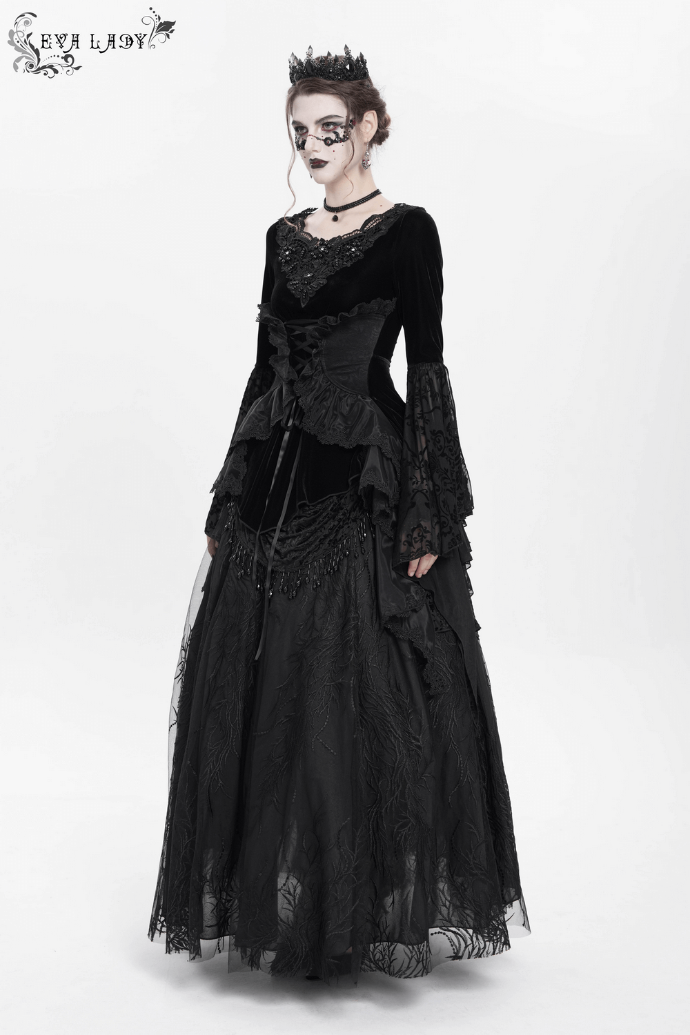 Elegant black velvet gothic top with lace sleeves and corset front, ideal for Victorian-inspired fashion.