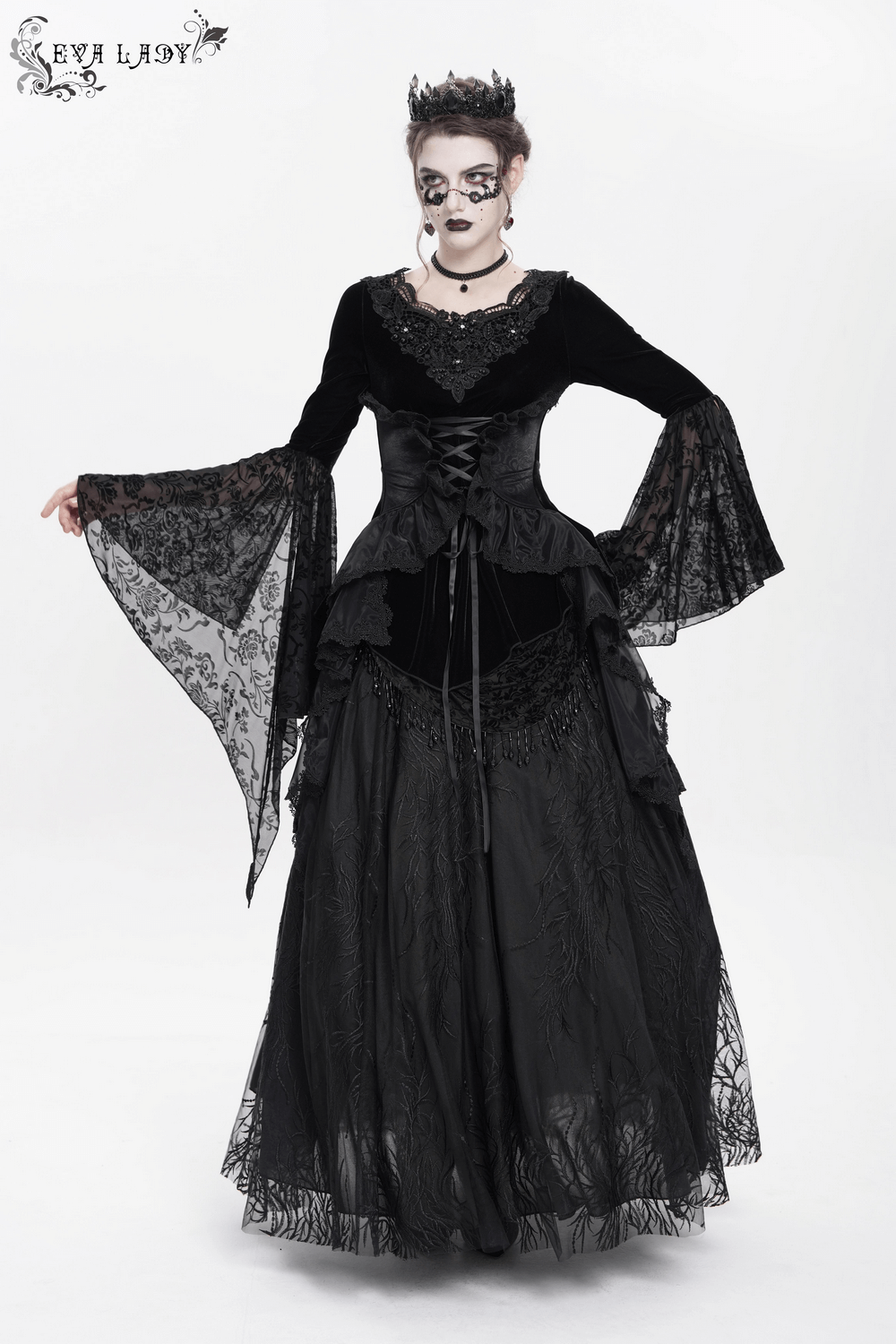 Gothic black velvet top with corset front and sheer lace sleeves, perfect for Victorian-inspired fashion.