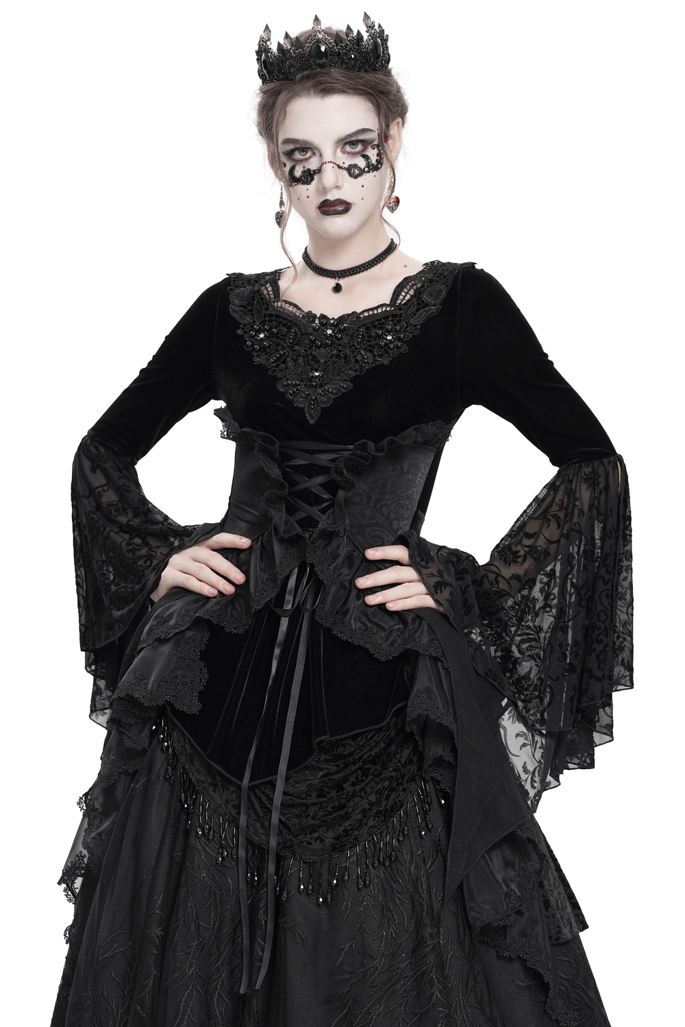 Gothic black velvet top with lace sleeves and corset front, perfect for Victorian-inspired fashion.