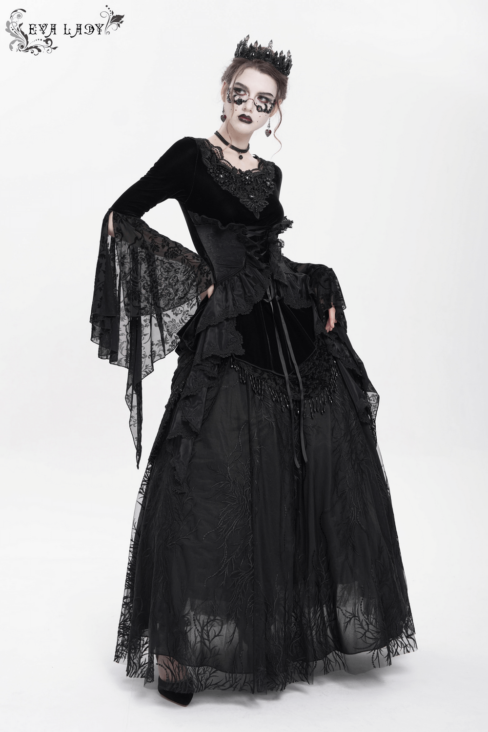 Gothic black velvet top with corset front, Victorian lace sleeves, and dramatic sheer bell sleeves, perfect for stylish evening wear.