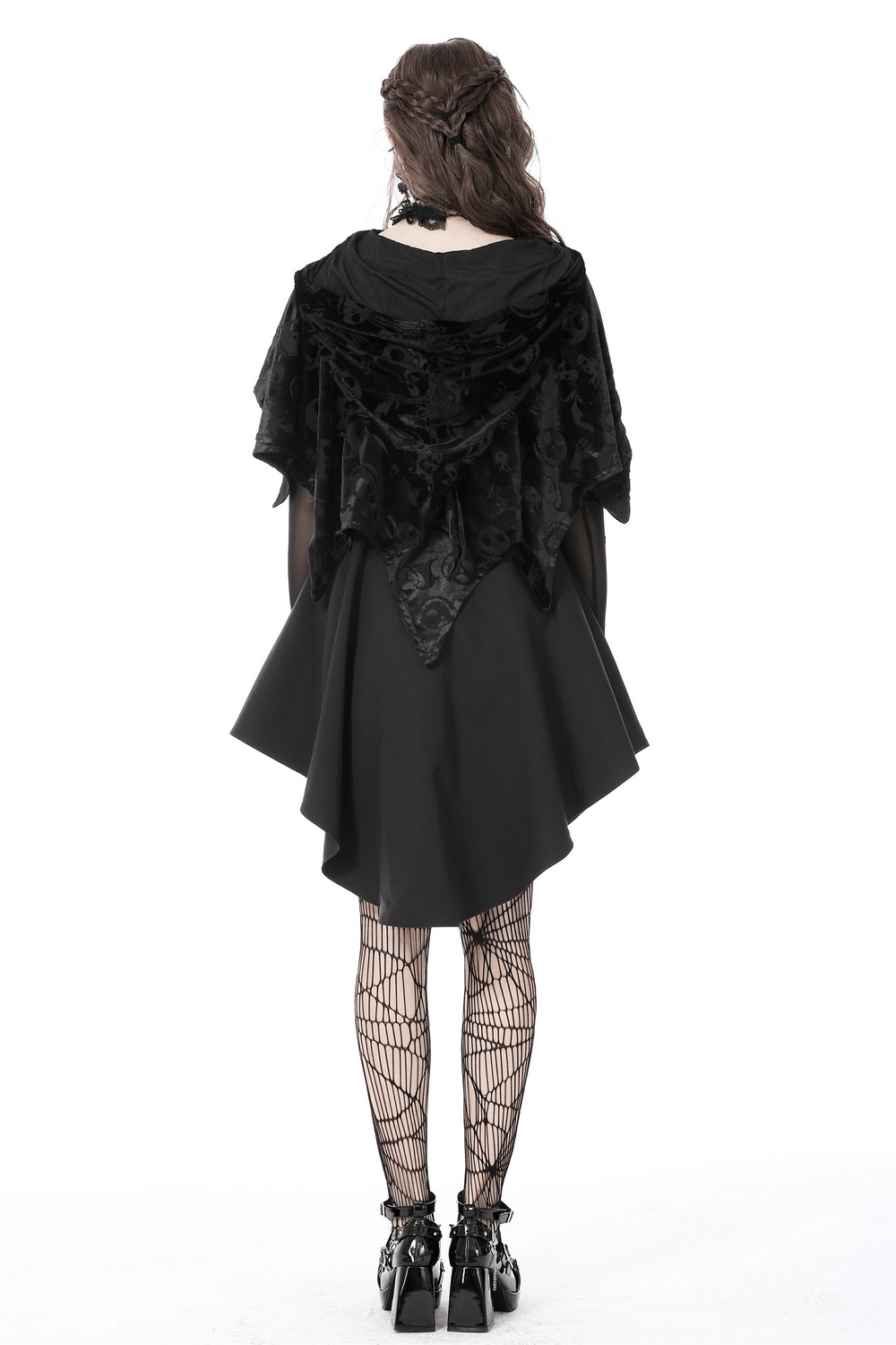 Gothic black velvet hooded cape with skull print, perfect for Halloween and cosplay, worn over a stylish dress.