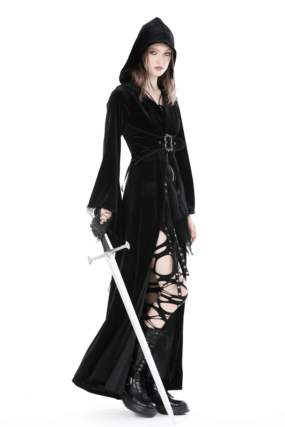 Dramatic black velvet hooded cloak with flowing silhouette and sword, perfect for gothic and witchy styles.