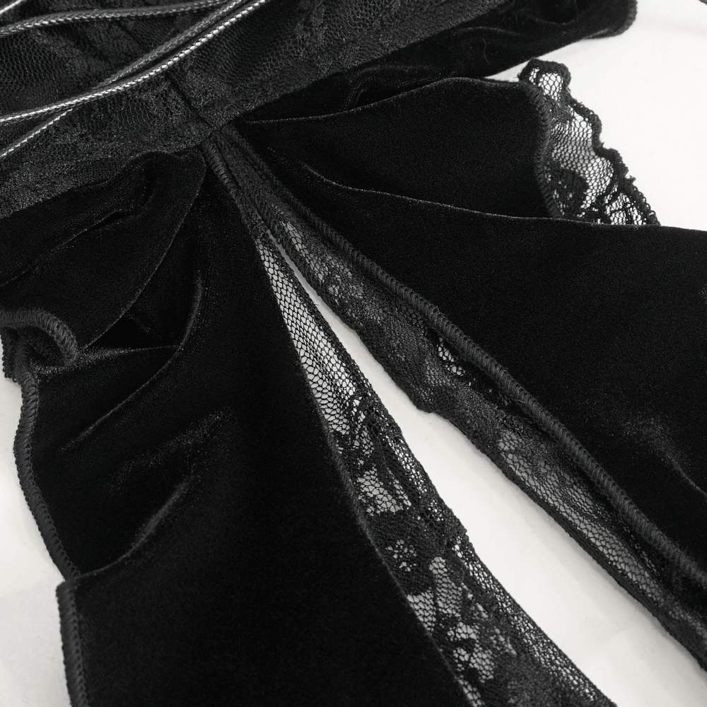 Close-up of black velvet bodysuit showcasing lace trim and chic lace-up details for a stylish lingerie look.