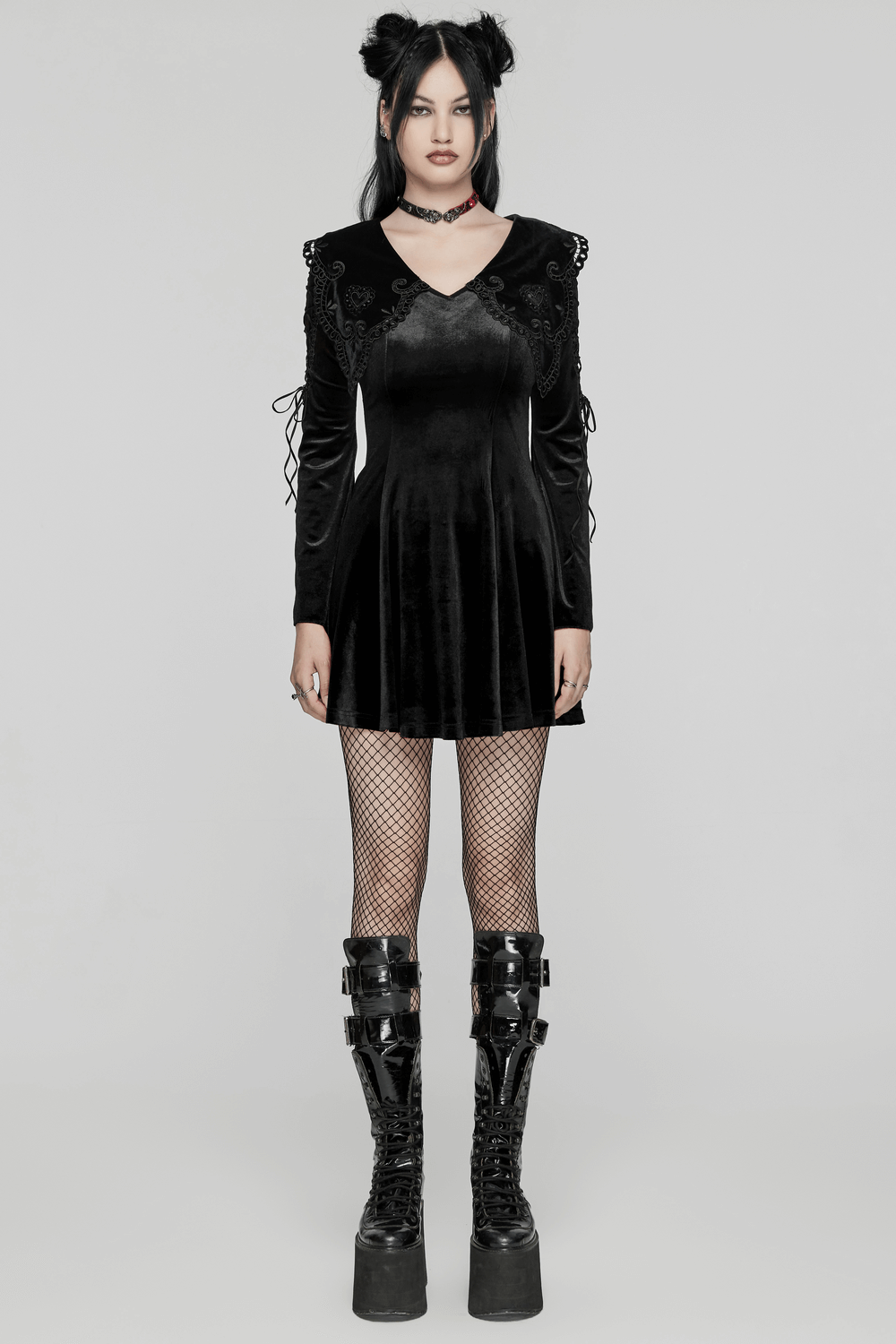 Black velvet lace-up dress with gothic appliques, flared sleeves, and lace details for a stunning gothic look.