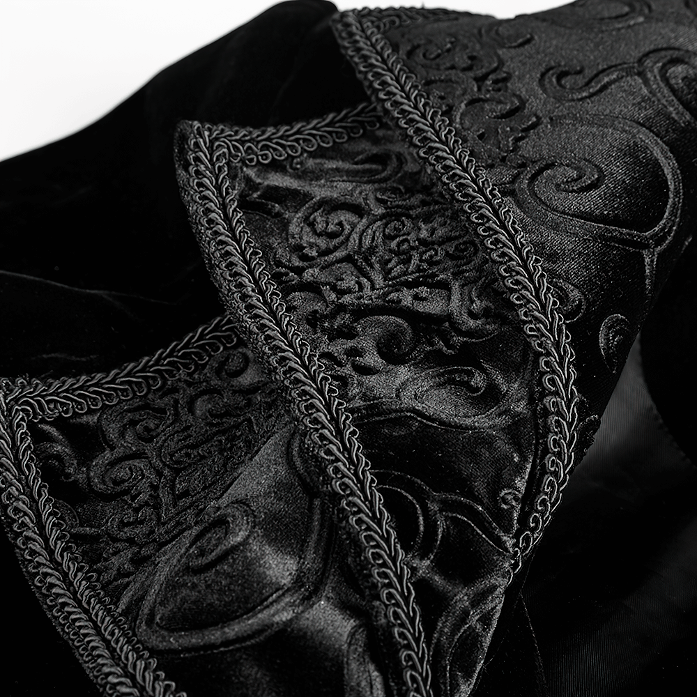Close-up of the intricate cascading collar detail on a black velvet Gothic long trench coat.
