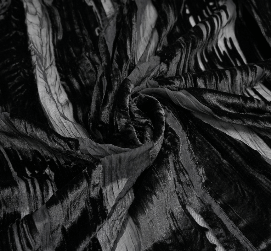 Close-up of luxurious black velvet fabric with flowing transparent stripes, perfect for gothic elegant style.
