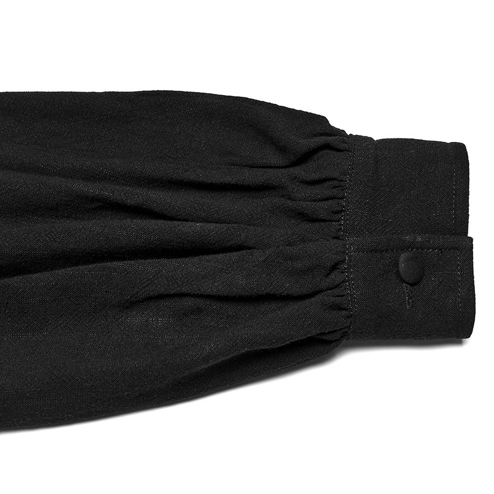 Black Victorian Embroidered Shirt with Lantern Sleeves cuff detail showcasing ruffled fabric and button.