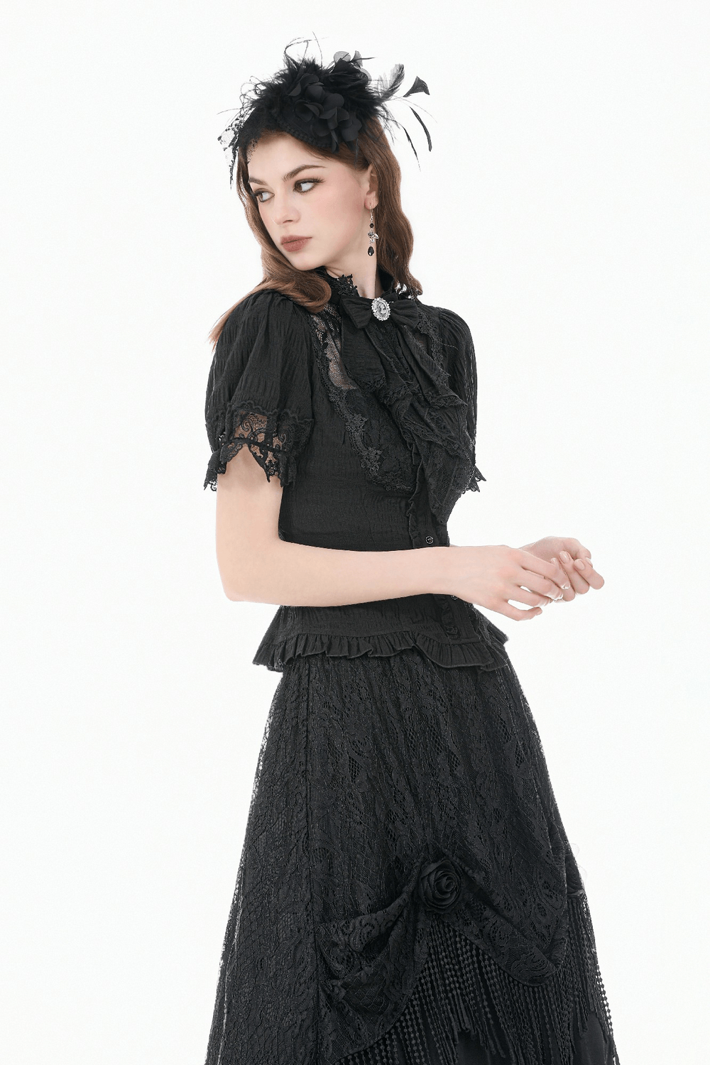 Black Victorian Gothic Blouse with Lace Sleeves worn by a model, featuring puff sleeves and lace detailing.