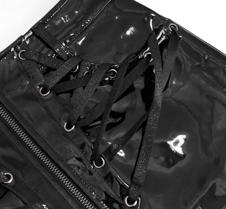 Close-up of black PU patent leather mini skirt showcasing decorative lacing and zipper details.