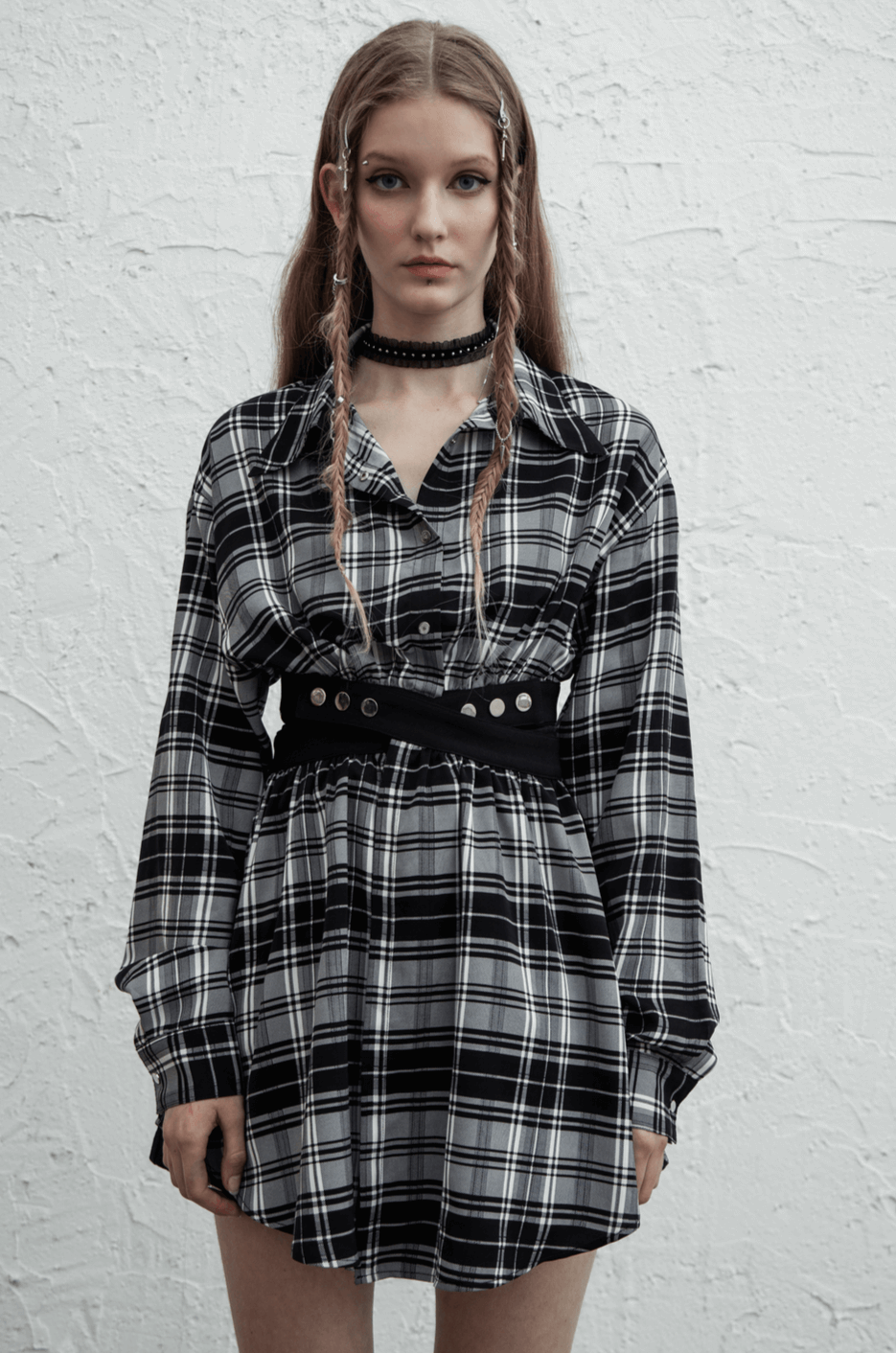 Model wearing a Black and White Plaid Punk Gothic Detachable Dress with a belted waist and choker, showcasing edgy style.