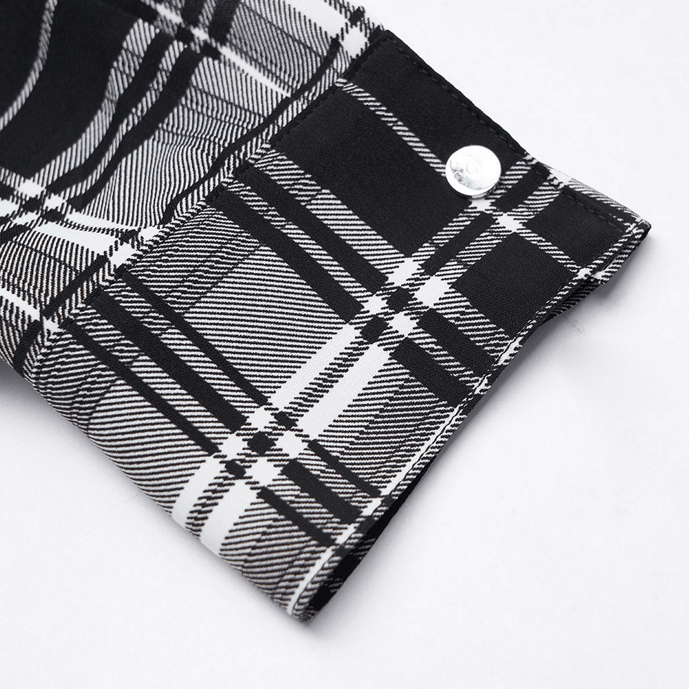 Detail of black and white plaid fabric showcasing the stylish pattern of the Punk Gothic Dress.