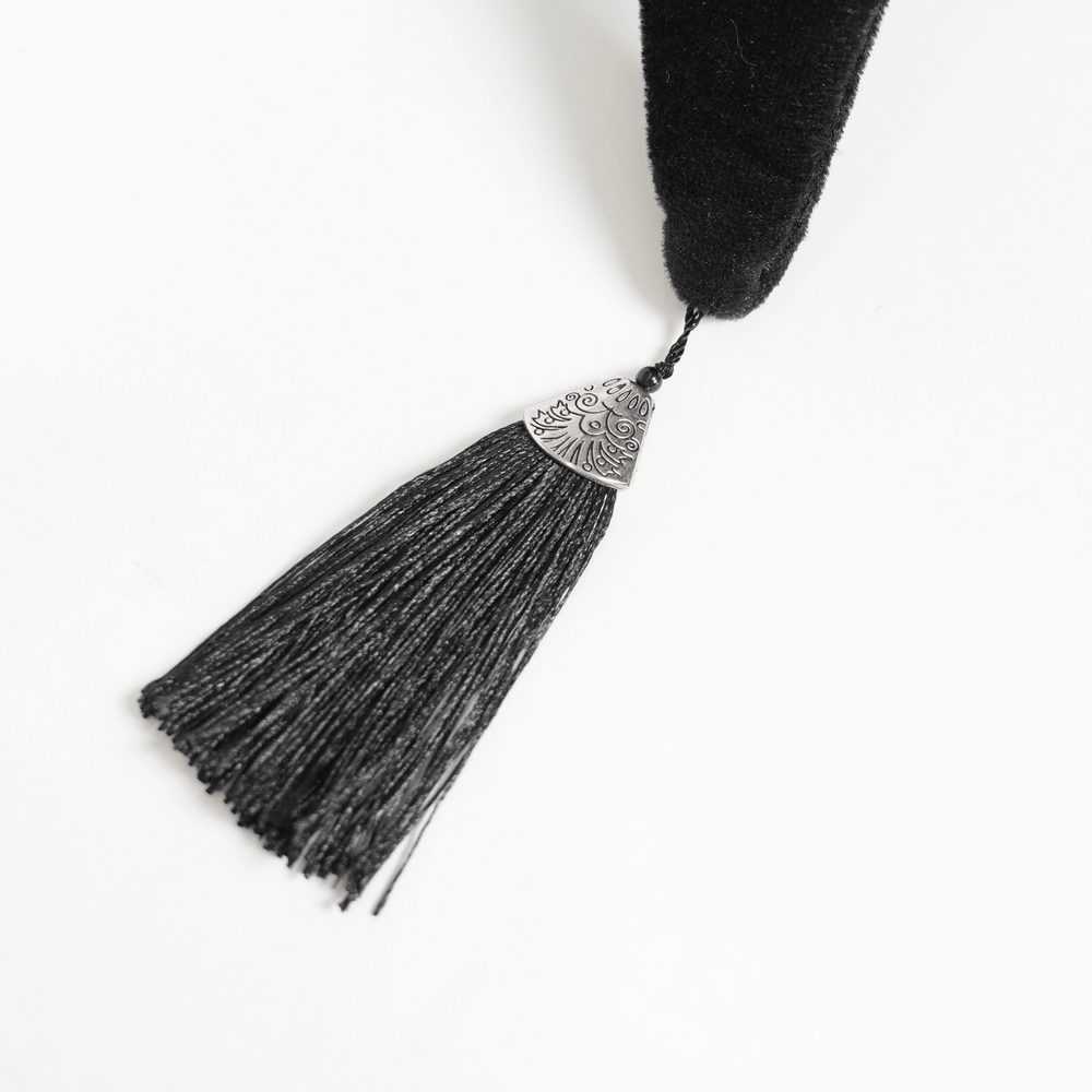 Detail of Black Witch Hat with Lace Fringe and Feather Detail showcasing a stylish black tassel.
