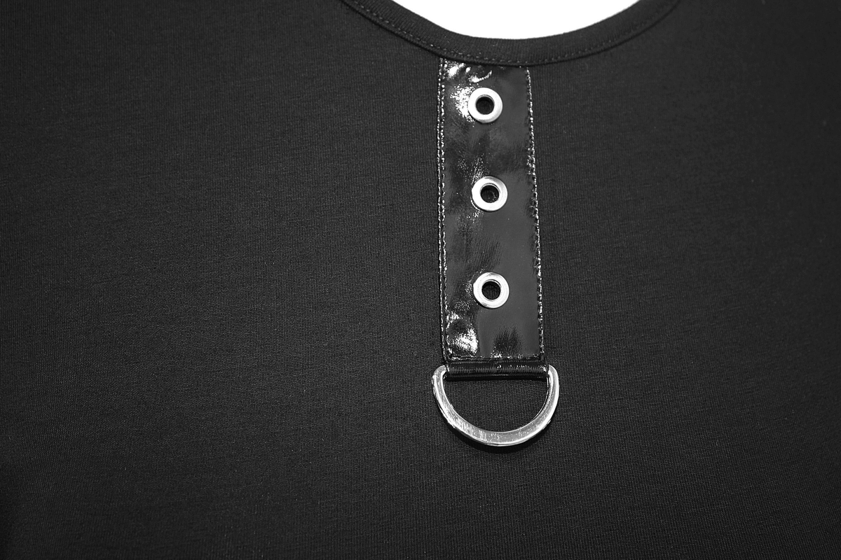 Close-up of black gothic dress featuring a stylish button placket with silver rivets and a sleek metal ring.