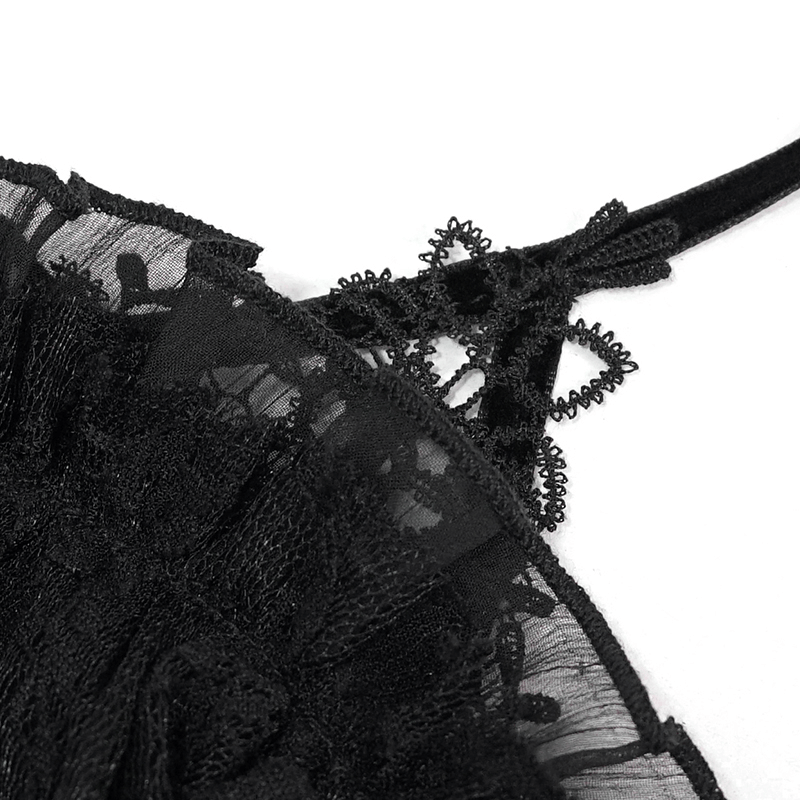 Close-up of lace detail on a black gothic off-shoulder mini dress, showcasing elegant design and adjustable straps.