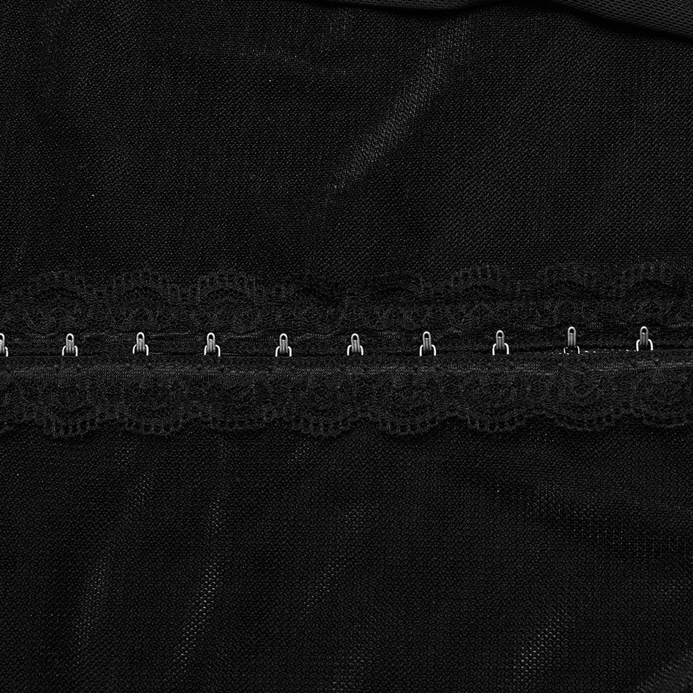 Close-up of hook closures and lace trim on a black sheer long-sleeved women's top, showcasing elegant details.