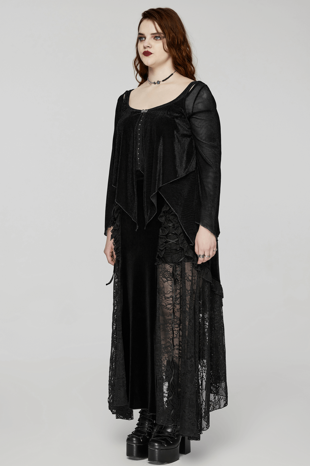 Stylish black women's top with bell sleeves and hook closures, featuring a chic, layered design and elegant silhouette.