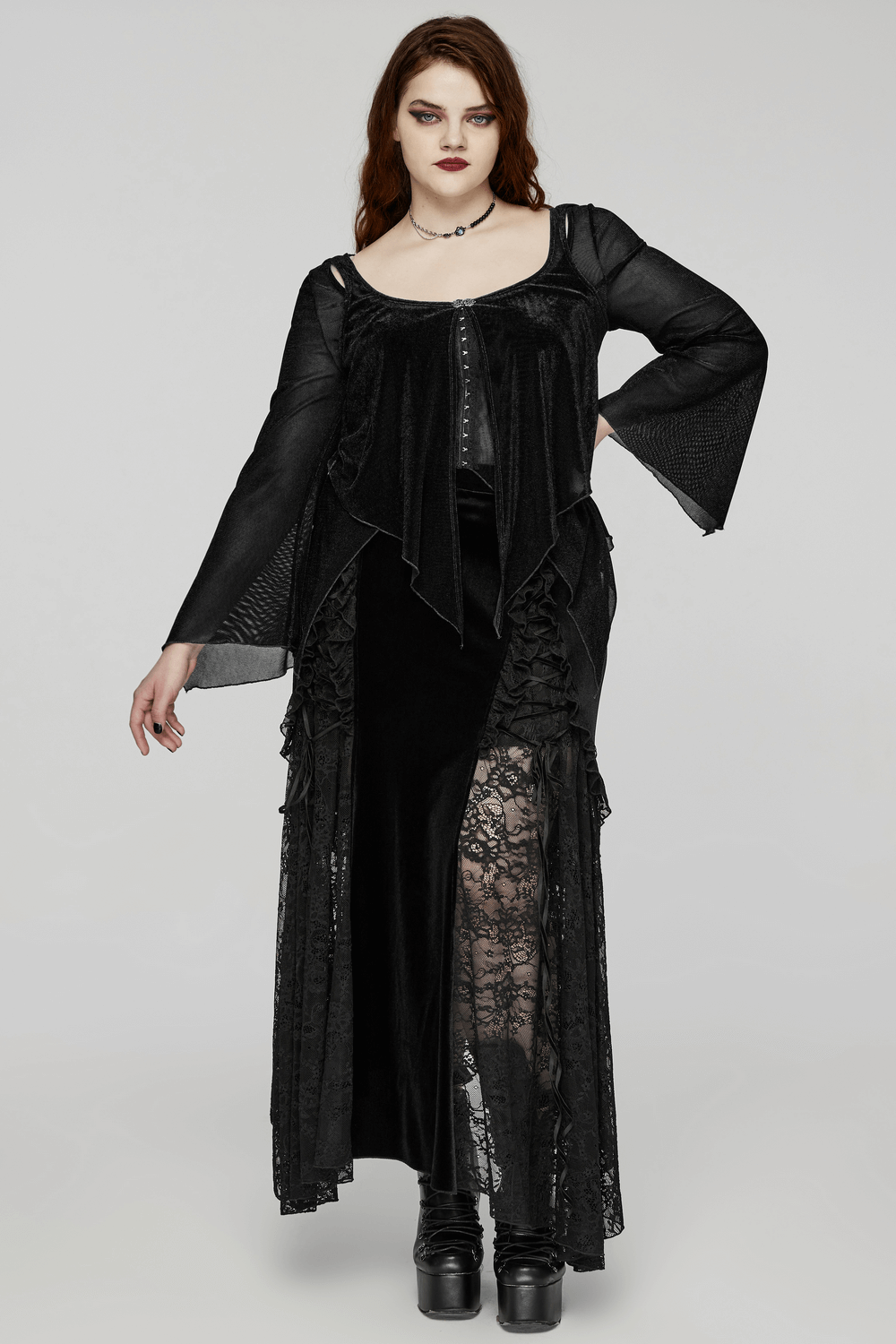 Stylish black sheer long-sleeved top with bell sleeves and hook fastenings for women.