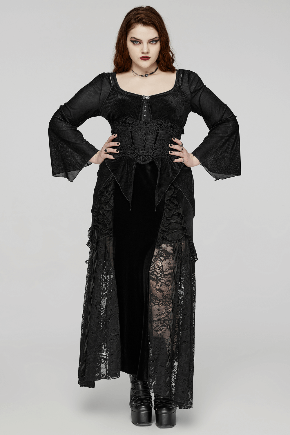 Black sheer long-sleeved women's top with bell sleeves and hook closures, perfect for elegant styling.