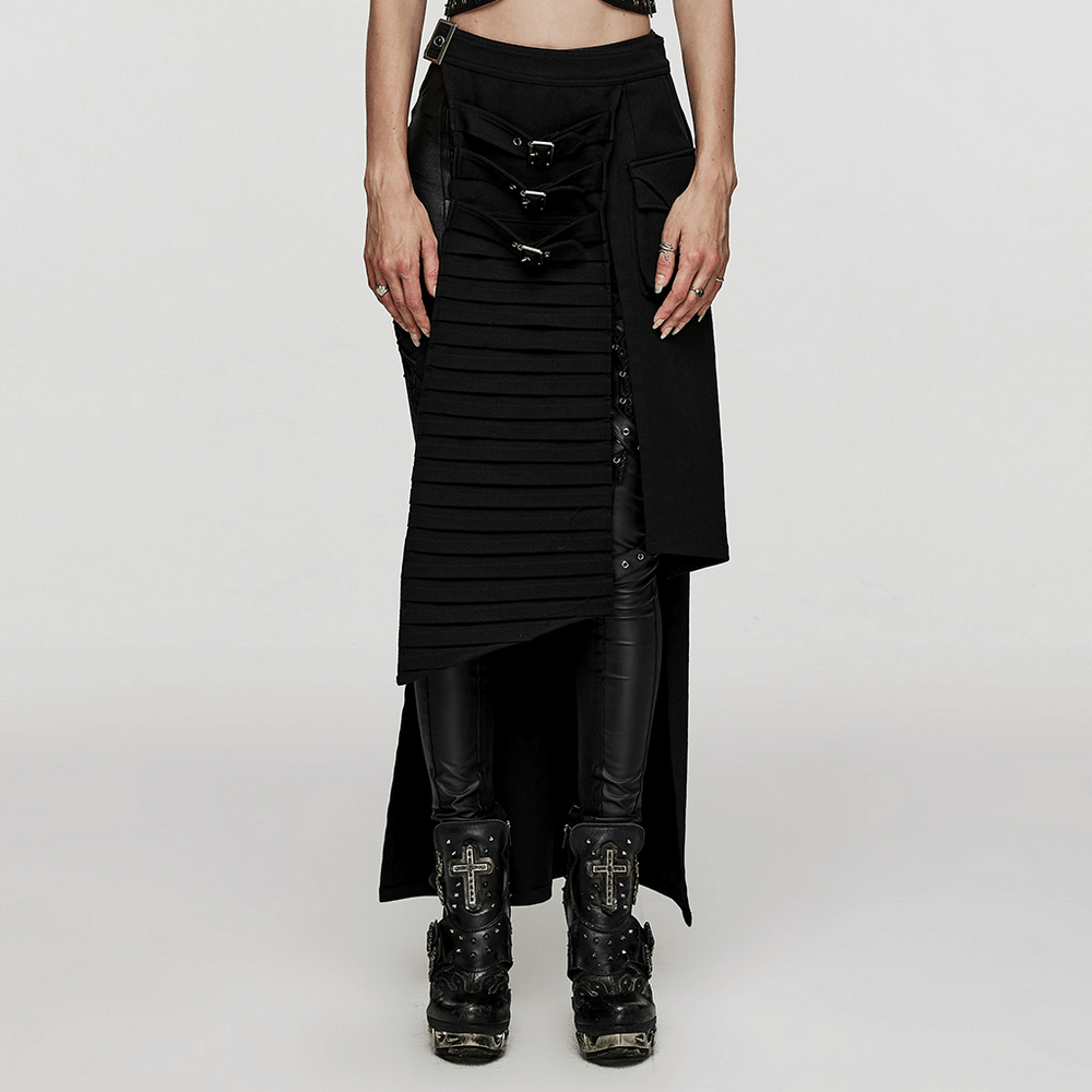 Black wrap maxi skirt with buckle accents, edgy pockets, and unique layered design for a goth-glam style.