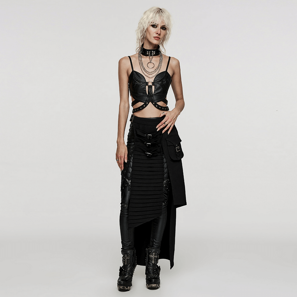 Model showcasing a black wrap maxi skirt with buckle accents, paired with edgy accessories for a goth-glam look.
