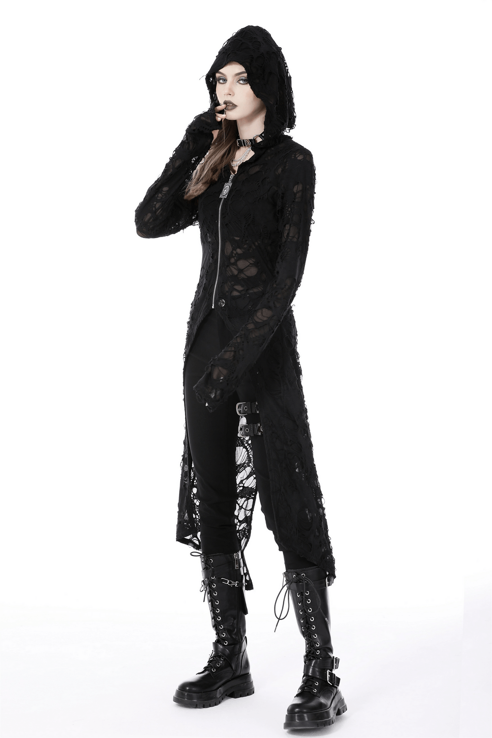 Woman in black lace longline gothic coat with hood, showcasing a distressed design and edgy style.