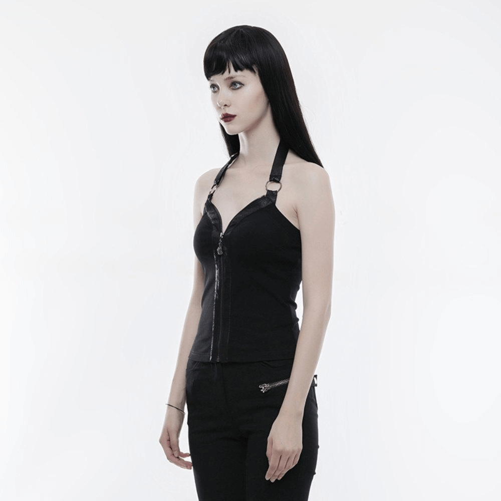 Model wearing a black zipper halter camisole with ring detailing, adding a punk rock vibe to her outfit.