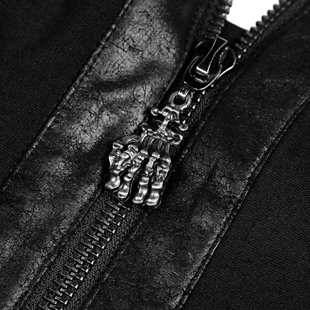 Close-up of the zipper pull featuring a skeleton hand on a black halter top with cracked PU leather detail.