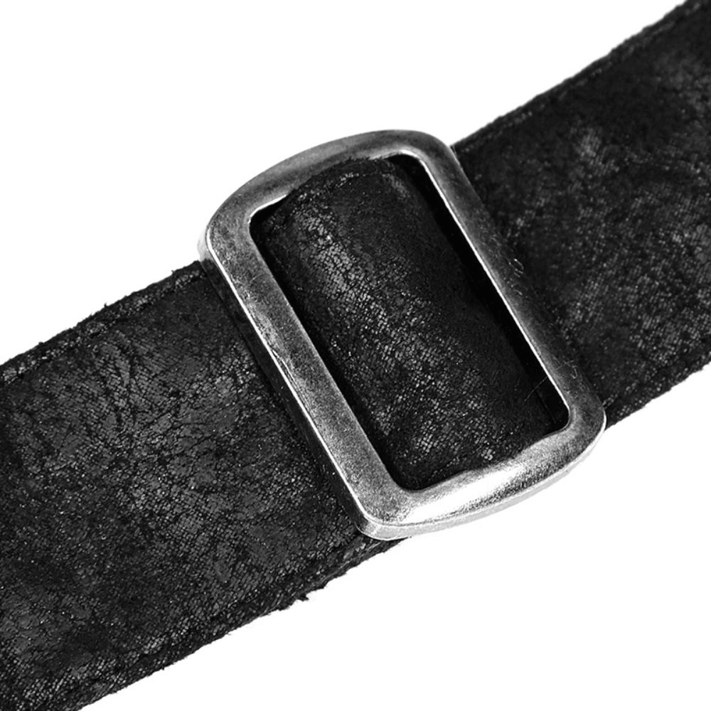 Close-up of a black cracked PU leather strap with a metallic buckle detail, perfect for punk rock fashion.
