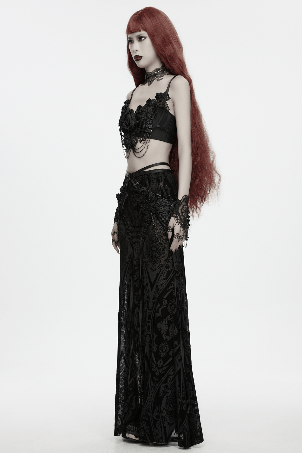 Bloody Rose Goth Lace Chain Bralet with Floral Detail worn by a model with long red hair and intricate goth accessories.