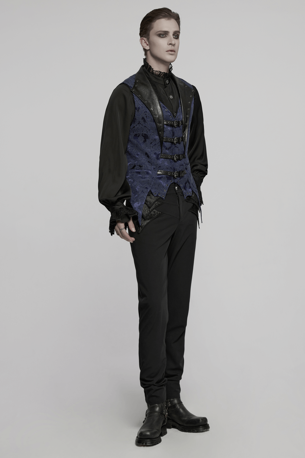 Men's blue gothic brocade waistcoat with leather lapel and buckles, perfect for steampunk and dark formal wear.