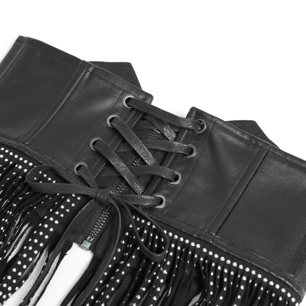 Bold black corset belt with studded fringe and lace-up detail for an edgy gothic look.